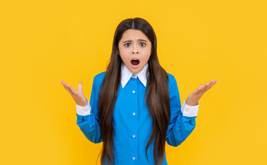 teenager girl. girl in school uniform. back to school. teenager student has amazed face. teenager...
