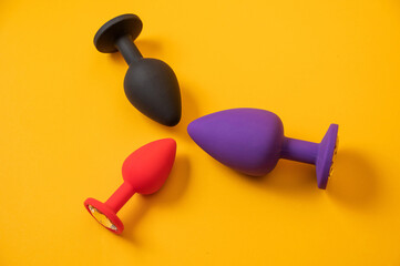 Black leather bdsm set on white sheet. 