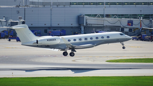 Gulfstream G650 private jet lands at Chicago Midway International Airport.