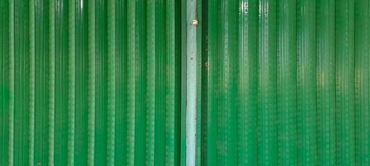 Rolling door steel stripe texture. folding gate iron door rolling door for shop or office doors