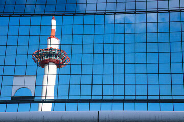 Reflection of a sky and a tower