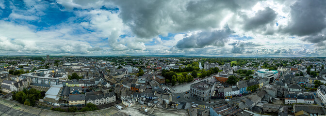 Aerial panorama of Kilkenny, city in Southern Ireland on the River Nore, views of the castle, Black abbey, St Canice's Cathedral, St. Francis Abbey - obrazy, fototapety, plakaty