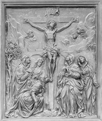 NAPLES, ITALY - APRIL 22, 2023:  The bronze relief of Crucifixion on the gate of church Basilica dell Incoronata Madre del Buon Consiglio from 20. cent.