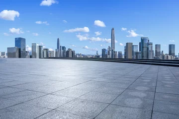 Zelfklevend Fotobehang Empty square floors and city skyline with modern buildings scenery in Shenzhen, Guangdong Province, China. © ABCDstock