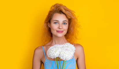 face photo of girl with mothers day chrysanthemum flowers. girl with mothers day