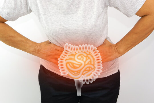 Asian woman suffering from stomachache. Chronic gastritis, menstruation and health concept.