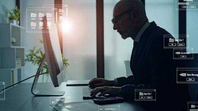 Middle aged businessman working in office and software development concept.