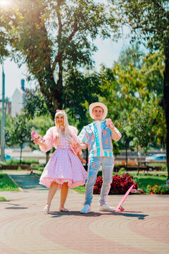 girl and boy walking around the city. The image of a popular doll for girls