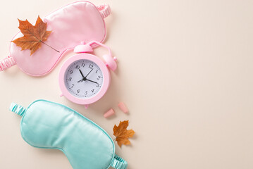 Elevate your sleep routine with top-view photograph exhibiting pink and blue sleep masks,...