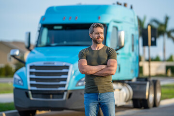 man driver near lorry. Semi trucks vehicle. Trucking owner. hispanic man posing in front of truck....