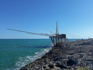 Fototapeta na wymiar Trabucco Gargano fishing tower in Vieste