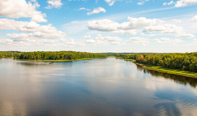 Beautiful summer landscape, river forest sky clouds Top view.Latvia.