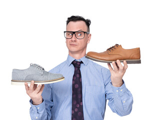 A man in glasses, shirt and tie holds two shoes in his hands, pointing at the camera, , isolated on a transparent background png. 