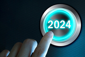 Happy new year 2024,Finger about to twist the start button 2024. Concept of planning.