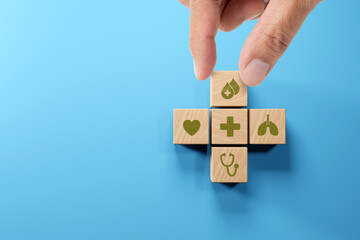 Health insurance concept. healthcare medical wooden cube block with icon, health and access to welfare health, 3D render