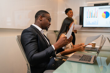 Fototapeta premium Group of professional business people are working and shaking hands while working in the creative office.