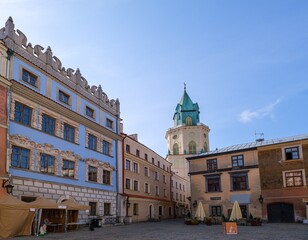 Architecture of Lublin Old Town, Lesser Poland. View of traditional colored tenements houses on central streets of Polish city of Lublin in sunny spring day © Ivan