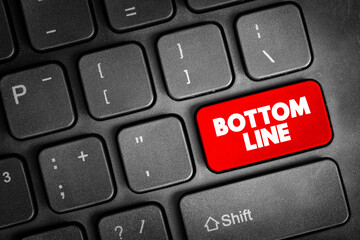 Bottom line - the final total of an account or balance sheet, text concept button on keyboard