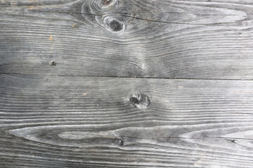 grey weathered wood detail plane straight board with knotholes