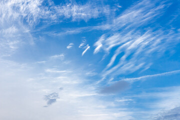 Naklejka na ściany i meble Beautiful blue sky. White cirrus clouds. Cloud landscape. Photo for the background