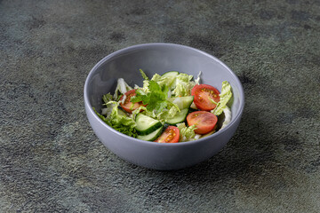 A bowl of salad with vegetables