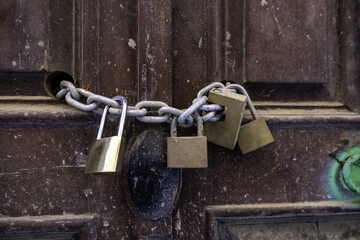 Old padlocks closed with chain