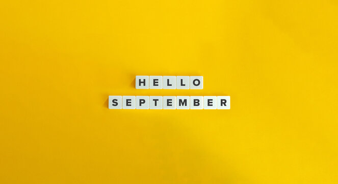 Hello September Banner. Letter Tiles on Yellow Background. Minimal Aesthetics.