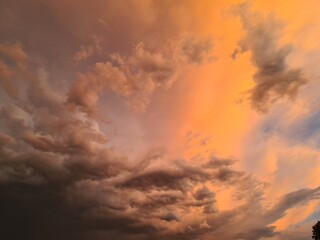 the cirrus clouds at the vibrant sunset
