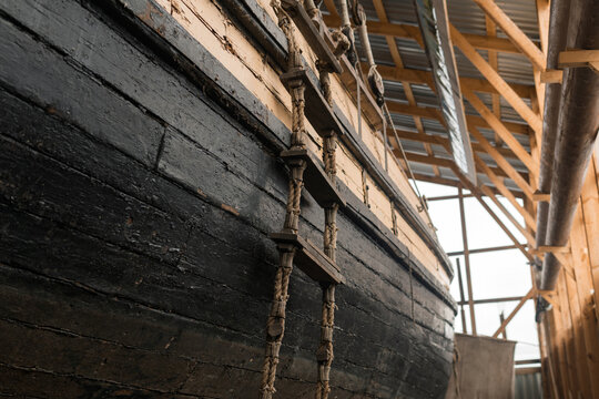 Board Of An Old Wooden Ship With A Ladder In The Museum