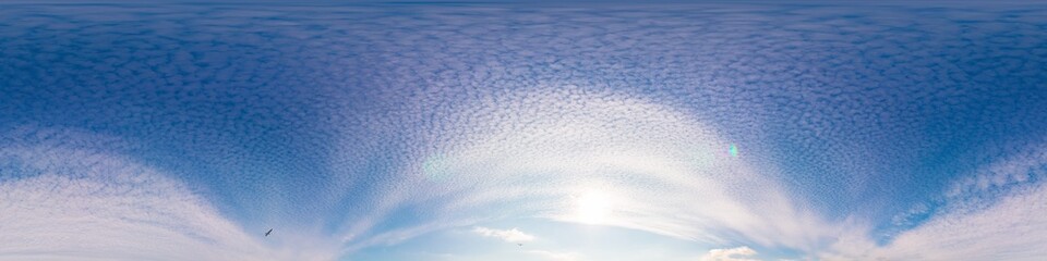 Sunset sky panorama with bright glowing pink Cirrus clouds. HDR 360 seamless spherical panorama. Full zenith or sky dome in 3D, sky replacement for aerial drone panoramas. Climate and weather change.