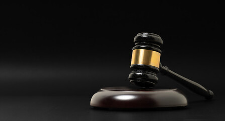 Judge's gavel hammer for adjudication, wooden auction hammer with a wooden stand. law and justice...