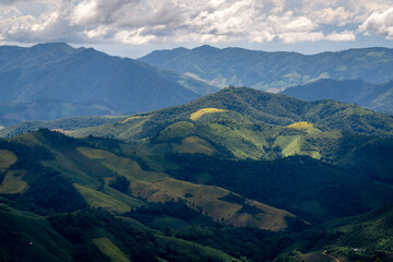 Beautiful mountain range view point with cumulonimbus cloud and storm in northern of Thailand (Tak province, Thailand)