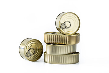 Various canned food in metal cans isolated on white background