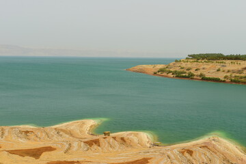 Welcome to the Dead Sea and its historic sites, a salt lake shared between Israel, the West Bank and Jordan. 09 June 2023 on a hot sunny day. Officially the lowest point on earth 430 metres, 1412 ft. 