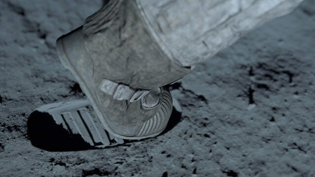 3D rendering. Lunar astronaut walking on the moon's surface and leaves a footprint in the lunar soil.3d rendering.
