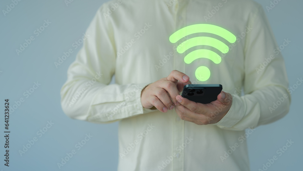 Aufkleber adult man searching for wifi on his mobile phone. concept of technology connectivity and connection 