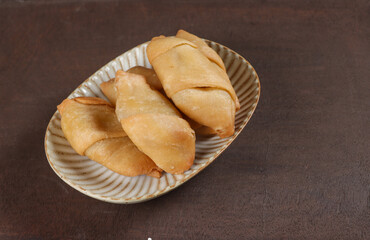 Pisang Molen is an Indonesia Street Food Made From Fried Banana Warp With Sheet Pastry.