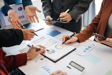 Business People Planning Strategy Analysis Office Concept. writing notes about sticky notes Laptop,tablet  Planning and Brainstorming Strategies in office