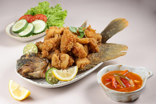 Gurameh Saus Asam Manis. Fried Carp Fillet With Sauce. Deep Fried Carp Fillet.