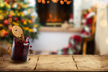 Mulled wine on Christmas home interior background with fireplace. Copy space