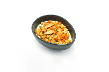 Fototapeta na wymiar Steamed egg with shrimp , mushroom and carrot in black bowl isolate on white background