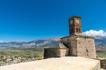 Fototapeta na wymiar The clock tower in the Ottoman castle fortress of Gjirokaster or Gjirokastra. Albanian