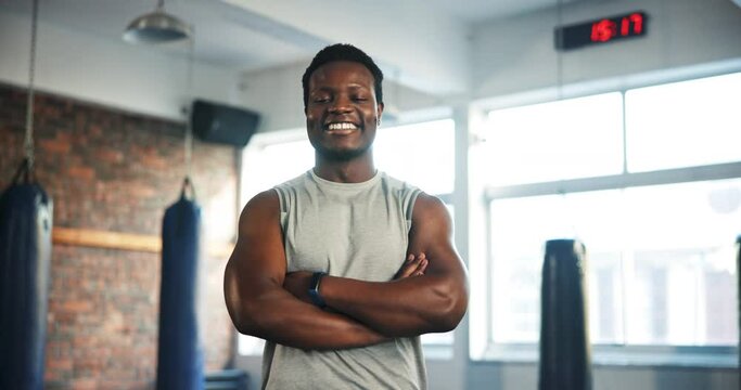 Gym, arms crossed or black man happy for exercise, training or personal trainer workout, boxing studio or challenge. Coach portrait, happiness or African bodybuilder smile for muscle building fitness