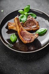 lamb cutlet on the bone fresh meat portion food ready to eat healthy appetizer meal food snack on the table