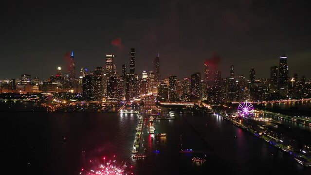 Drone shot of the Chicago skyline, during fourth of July night celebration