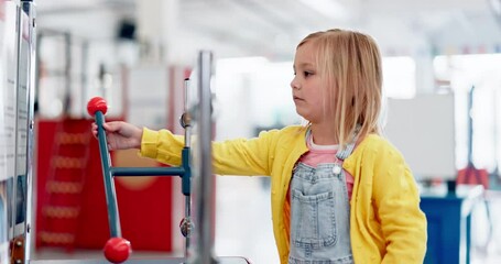 Playing, museum and a child with a game for science, education or learning about an atom. Creative, kindergarten and a girl or student at an exhibition for innovation, research or an activity - Powered by Adobe