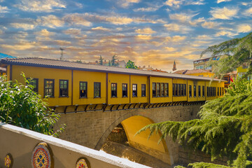 Irgandı bridge Bursa, Turkey, yellow bridge, touristic bazaar photo, old Ottoman bridge view ,...
