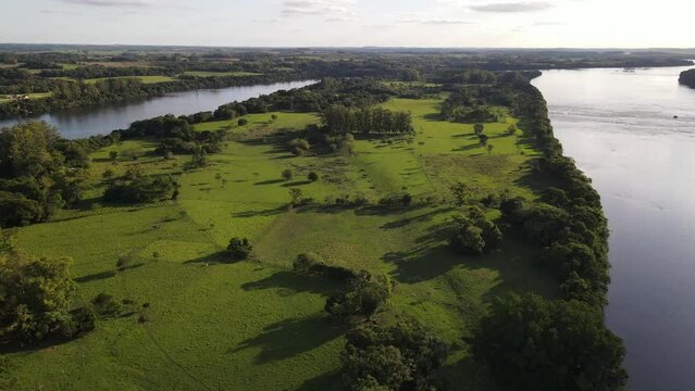 Aerial Shot Of Large Green Eyot In Beautiful River, Uruguay 