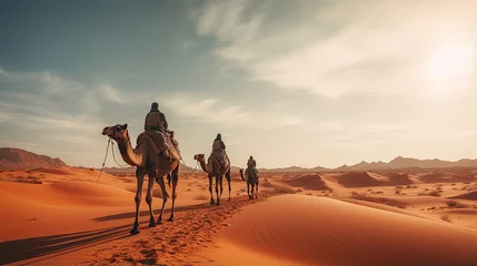Fotobehang Nomads traversing a vast desert with camels © javier