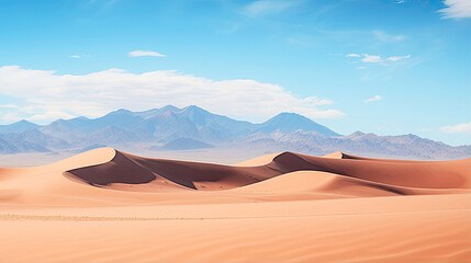 Fototapeta na wymiar Pristine desert landscape with sand dunes and distant mountains